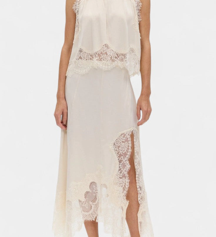 Nada Midi Suknja s Čipkastim Detaljima i Asimetričnom Porubom